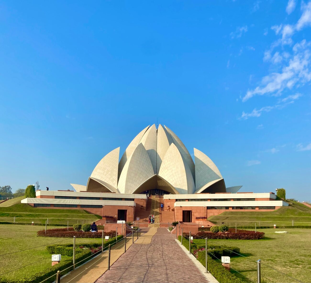 Lotus Temple’s white marble petals illuminated at dusk in Delhi
