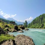 Lush green meadows of Pahalgam with Lidder River