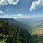 Mahabaleshwar’s misty hills and vibrant strawberry fields under a serene Maharashtra sky