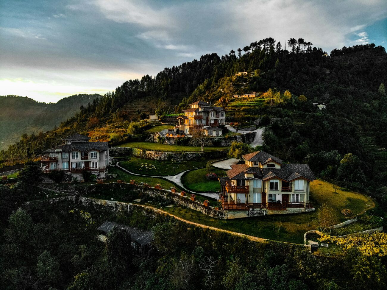 Mussoorie’s Mall Road with misty Himalayan hills and colonial buildings