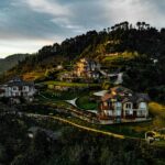 Mussoorie’s Mall Road with misty Himalayan hills and colonial buildings