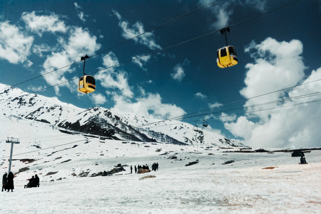 Snow-covered slopes of Gulmarg with skiers