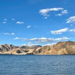 Vibrant blue waters of Pangong Lake with Himalayan backdrop